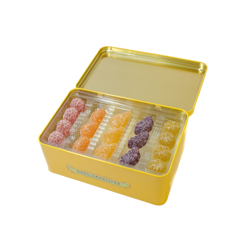 boite metal jaune ouverte pates de fruits forme fruits cruzilles cinq rangees